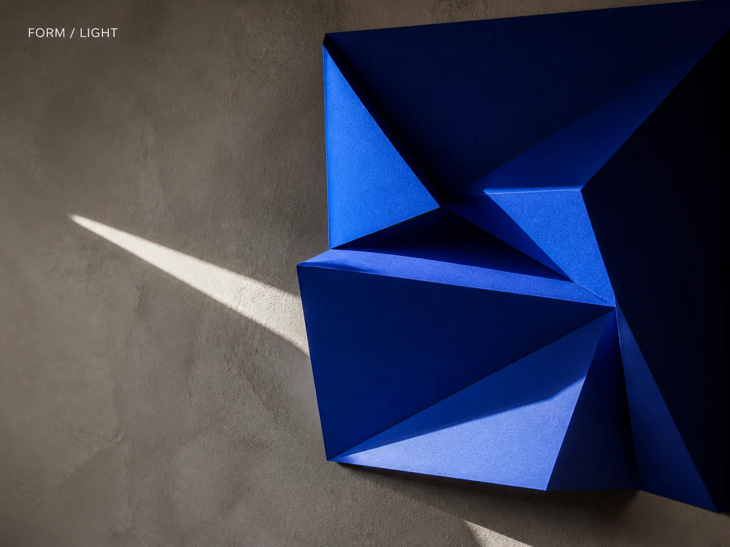 Cobalt paper-sculpture event poster with bold FORM LIGHT typography generated by Video Studio AI
